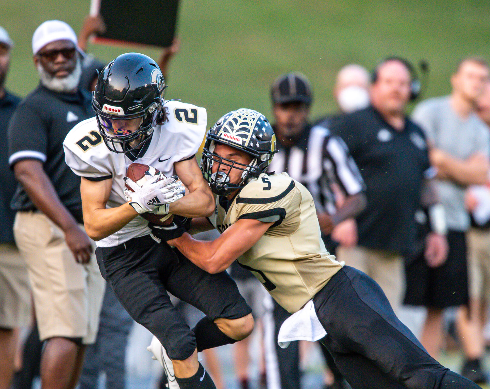 The Warriors dominated the Spiders 49-21.